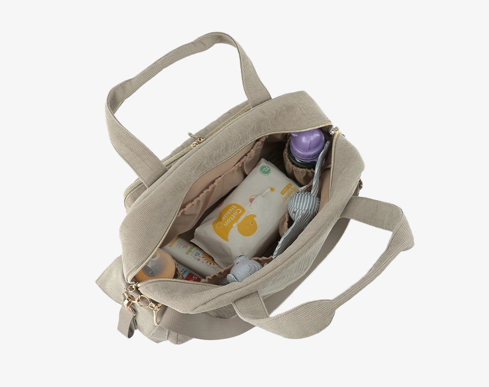 תיק החתלה לונה בז׳ כהה קורדרוי