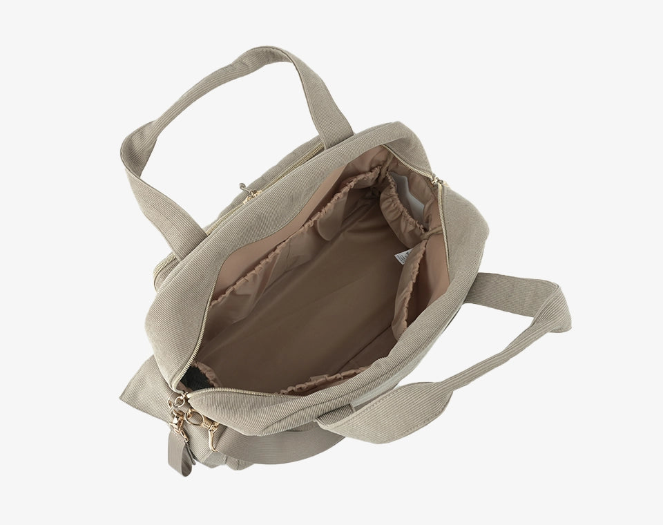 תיק החתלה לונה בז׳ כהה קורדרוי